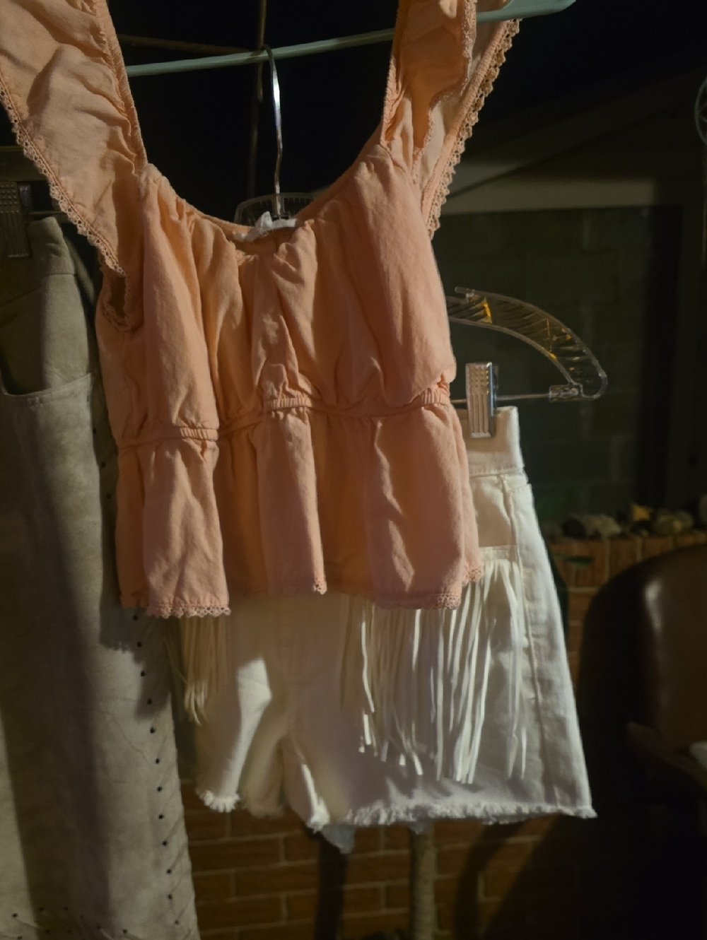 Small pink top with no boundaries Western style shorts